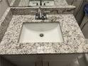 Bathroom featuring a stylish granite countertop and basin sink at 105 Lena Cir, Stockbridge, GA 30281