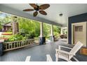 Spacious front porch with seating area and ceiling fan at 120 Warren Ne St, Atlanta, GA 30317