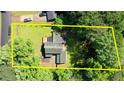 Aerial view of the property line and well-maintained landscape with mature trees at 2926 Swarthmore Dr, Lawrenceville, GA 30044