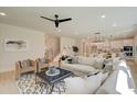Open-concept living area with an airy feel, neutral decor, and bright lighting at 110 Prescott Manor Dr, Canton, GA 30115