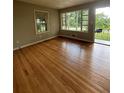 Bright living room with hardwood floors, large windows, and neutral paint at 2069 Bixler Circle, Decatur, GA 30032