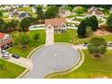 A beautiful home sits on a large lot in a quiet cul-de-sac at 13347 Henderson Ct, Hampton, GA 30228