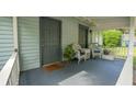 Inviting porch with chairs offering a relaxing outdoor space at 2881 Parrott Nw Ave, Atlanta, GA 30318