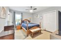 Comfortable bedroom with neutral walls, a plush bed, and ample closet space at 1626 Oak Knoll Se Cir, Atlanta, GA 30315