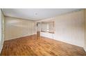 Bright living room featuring wood floors, natural light, and neutral tones at 4642 Elmhurst Dr, Douglasville, GA 30135