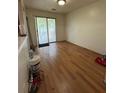 Bright dining room featuring wood floors and sliding glass doors to the backyard at 3739 Jamestown Ct, Doraville, GA 30340
