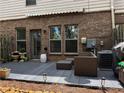 Outdoor patio space featuring stylish furniture and landscaped surroundings for relaxation at 4858 Stratford Ln, Johns Creek, GA 30022