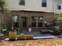 Backyard patio, ideal for outdoor dining and relaxation, offers a peaceful retreat at 4858 Stratford Ln, Johns Creek, GA 30022