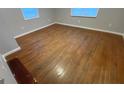 Spacious bedroom with wood floors and bright lighting at 2391 Randall Ave, Lithonia, GA 30058