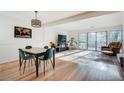 Open floor plan view featuring a dining area and living room with sliding glass doors at 1205 Druid Knoll Ne Dr, Brookhaven, GA 30319