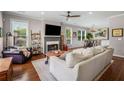 Bright living room featuring hardwood floors, fireplace, and comfortable seating area at 925 Hill Se St, Atlanta, GA 30315
