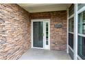 Close-up view of the home's entrance with stone wall and address number 2061 at 2061 Grove Field Lane #13, Marietta, GA 30064