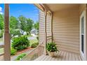 Inviting front porch featuring decorative columns and views of the neighborhood at 1145 Cool Springs Nw Dr, Kennesaw, GA 30144