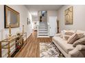 Inviting living area featuring modern decor and hardwood floors at 255 Skipjack Ct, Covington, GA 30016