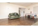 Bright living room featuring hardwood floors and lots of natural light flowing into the living space at 2576 Flat Shoals Dr, Decatur, GA 30034
