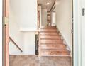 Inviting entryway with hardwood floors and staircase leading to the upper level at 3688 E Bay St, Duluth, GA 30096
