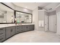 A spacious bathroom featuring double vanity sinks, modern fixtures, and neutral tones at 3801 Bays Ferry Trl, Marietta, GA 30062