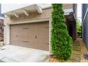 Attached two-car garage providing convenient parking and storage space at 569 Mirrormont Se Dr, Smyrna, GA 30080