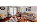 Cozy living room featuring hardwood floors and stylish, comfortable furnishings at 3440 Essex Ave # 103, Atlanta, GA 30339