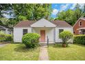 Charming single-story home with a well-maintained front yard and inviting curb appeal at 2447 Crestview Ave, Decatur, GA 30032