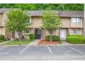 Charming townhouse complex with well-manicured landscaping and ample parking spaces at 2004 Stratford Se Pl, Marietta, GA 30067