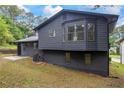Two-story home featuring a large window and siding at 2246 Hightrail Ct, Lithonia, GA 30058