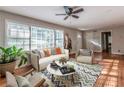 Cozy living room with hardwood floors, neutral colors, and plenty of seating for guests at 2174 Beecher Sw Rd, Atlanta, GA 30311