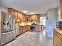Spacious kitchen with stainless steel appliances and tile flooring at 1257 Independence Way, Marietta, GA 30062