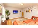Cozy living room featuring hardwood floors and comfortable seating at 398 Nw Westchester Blvd, Atlanta, GA 30314