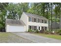 Two story home with vinyl siding, with shutters and a two car attached garage at 4468 Whitt Station Nw Run, Acworth, GA 30101