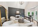Bright office with a fireplace, vaulted ceilings, and views of the backyard at 3851 Glenhurst Se Dr, Smyrna, GA 30080