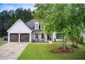 Well-maintained home with a spacious front yard and a classic architectural style at 51 Norton Ave, Acworth, GA 30101