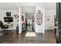 Inviting entryway with hardwood floors, neutral walls, and views to the outdoors, perfect for a warm welcome at 310 Woodbrook Crst, Canton, GA 30114