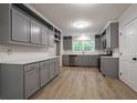 Spacious kitchen with modern gray cabinets and stainless steel appliances at 375 Buckingham Dr, Marietta, GA 30066