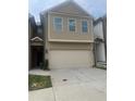 Charming two-story home with a two-car garage at 243 Beau St, Lilburn, GA 30047