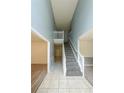 Entryway and foyer boasting high ceilings, neutral walls, and a stairway at 1528 Rogers Crossing Dr, Lithonia, GA 30058