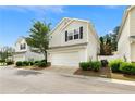 Charming two-story home with attached two-car garage, with neutral siding and black shutters at 202 Windcroft Nw Ct, Acworth, GA 30101