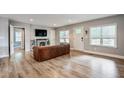 Bright living room with hardwood floors, fireplace, and ample natural light at 1740 Bouldercrest Se Rd, Atlanta, GA 30316