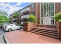 Brick building with a grand entrance, large windows, and well-maintained landscaping at 305 Ridley Howard Ct, Decatur, GA 30030