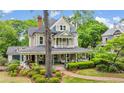 Attractive house with a spacious wrap-around porch perfect for outdoor living at 185 Elizabeth St, Atlanta, GA 30307