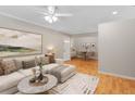 A bright living room that opens to the dining area with hardwood floors and fresh paint at 3486 Essex Ave # 88, Atlanta, GA 30339