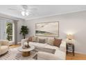 A beautifully decorated living room with natural light, modern furniture, and serene view at 3486 Essex Ave # 88, Atlanta, GA 30339