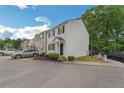 Inviting two-story home with white siding, black shutters, and manicured landscaping at 285 Enterprise Path, Hiram, GA 30141