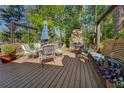 Spacious wooden deck perfect for outdoor dining and relaxation with lake views at 455 Mayo Rd, Covington, GA 30014