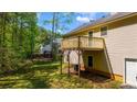 A wooden deck is a great addition to this home's backyard at 379 Villa Rosa Way, Temple, GA 30179