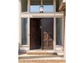Elegant front door with sidelights and transom window at 1178 Roxboro Ne Cv, Atlanta, GA 30324