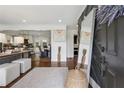 Stylish foyer with hardwood floors leading to the kitchen and dining area at 1154 Pair Sw Rd, Marietta, GA 30060