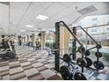 Well-equipped gym with modern equipment, machines and floor to ceiling windows at 2479 Peachtree Rd # 503, Atlanta, GA 30305