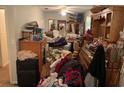 Cluttered bedroom with lots of items at 3683 Miller St, Lithia Springs, GA 30122
