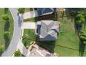 Aerial view of home with a well-manicured lawn, mature trees, and property line at 4280 Castlewood Rd, Cumming, GA 30040
